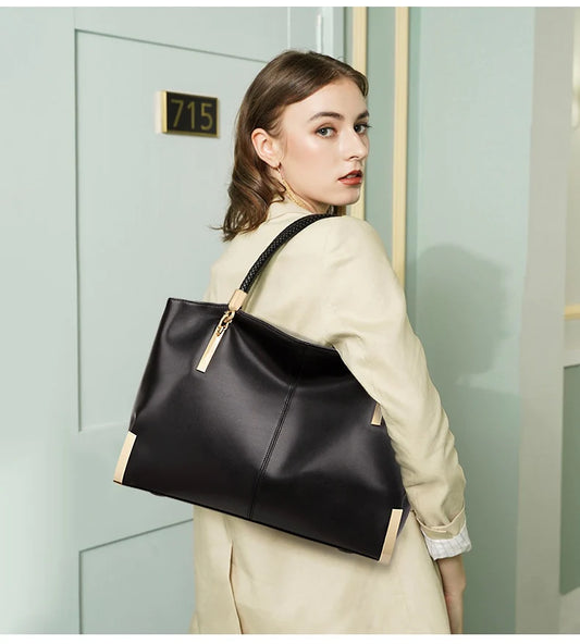 woman with black leather handbag