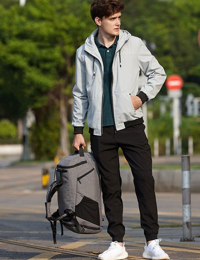man with duffle bag