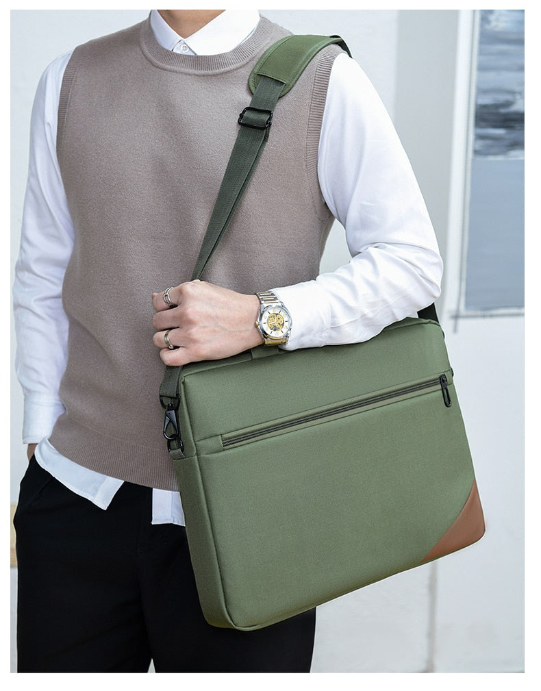 man with laptop bag